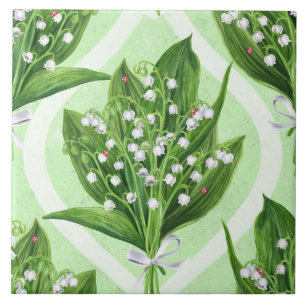 Bouquet of lily of the valley flowers on blue tile