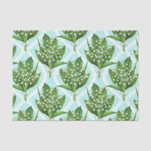 Bouquet of lily of the valley flowers on blue tissue paper