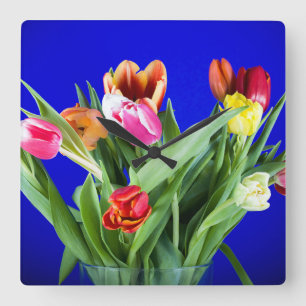 Bouquet of tulips on blue square wall clock
