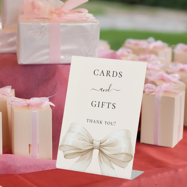 Bow ivory cards gifts sign (Creator Uploaded)