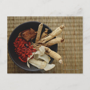 Bowl filled with Chinese medicinal herbs Postcard