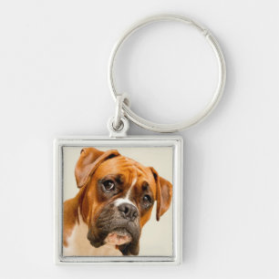 Boxer puppy on ivory cream backdrop. key ring