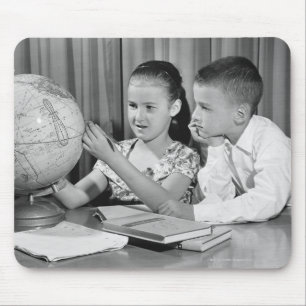 Boy and Girl Viewing Globe Mouse Pad