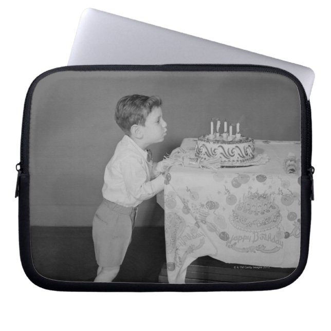Boy Blowing Out Candles Laptop Sleeve (Front)