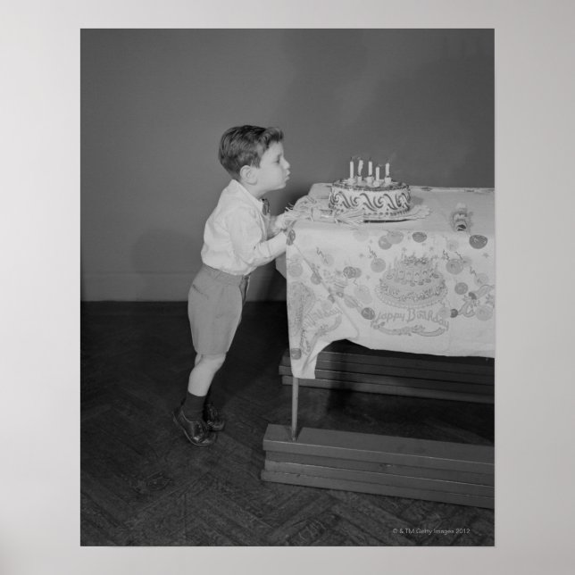 Boy Blowing Out Candles Poster (Front)