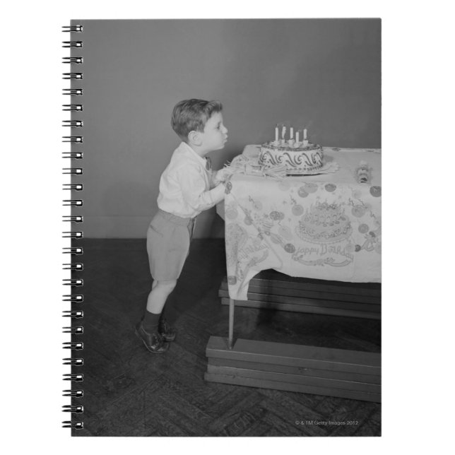 Boy Blowing Out Candles Spiral Notebook (Front)