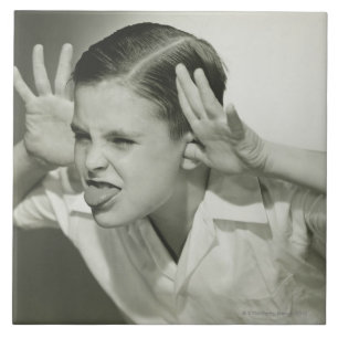 Boy Making Face Tile