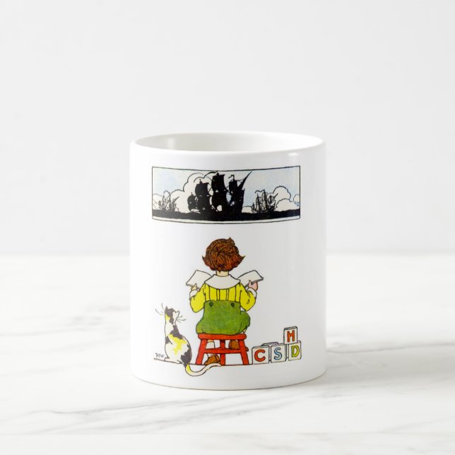 Boy reading coffee mug (Center)
