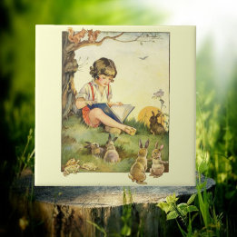 Boy reading under tree with rabbits tile