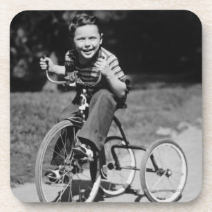 Boy Riding Tricycle Coaster