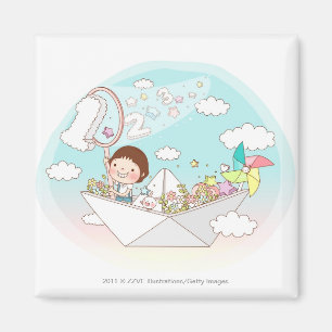 Boy sitting in paper boat magnet