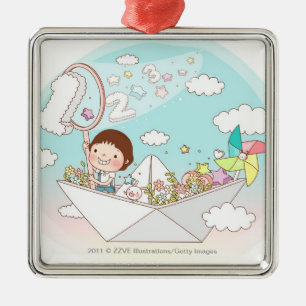 Boy sitting in paper boat metal tree decoration