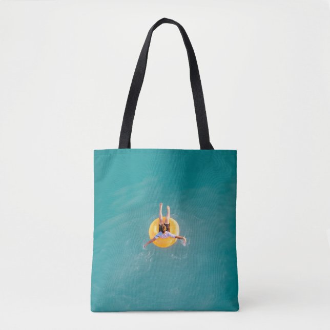 Boy sitting on buoy tote bag (Front)