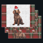 Boykin Spaniel Christmas Dog Deep Red Plaid Wrapping Paper Sheet<br><div class="desc">An adorable Boykin Spaniel dog is ready for the holiday season with his Santa hat. This cute Christmas dog is paired with a red holiday plaid on this set of gift wrap for the dog lover.</div>