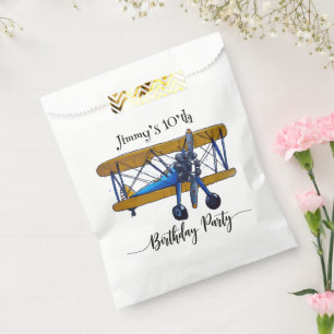 Boys birthday party with blue and yellow biplane favour bags