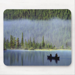 Boys fishing from canoe with mist in mouse pad