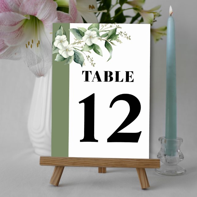 Branch with greenery and white flowers wedding table number (Creator Uploaded)