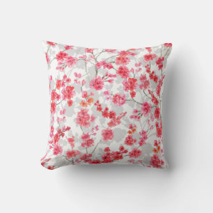 Branches of cherry blossoms on white and grey back cushion