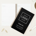 Branded Black Business Logo Weekly Planner<br><div class="desc">A sleek black weekly planner designed for businesses to brand with their own custom logo, employee name, business name, slogan, location, and website. The clean framed logo placement paired with elegant script accents creates a professional organisational tool for staff, clients, or corporate gifting. All text fields and the logo upload...</div>