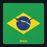 Brazil Flag Dazzling Patriotic Square Wall Clock<br><div class="desc">Brazil Flag Dazzling Patriotic Square Wall Clock in the colors and the elements of the Brazil national flag covering the front of the clock. National flag colors are complemented with the text "Brazil" on the bottom. Text is fully customizable using "Customize it!" feature. Feel free to change it, remove it...</div>