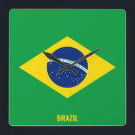 Brazil Flag Dazzling Patriotic Square Wall Clock<br><div class="desc">Brazil Flag Dazzling Patriotic Square Wall Clock in the colors and the elements of the Brazil national flag covering the front of the clock. National flag colors are complemented with the text "Brazil" on the bottom. Text is fully customizable using "Customize it!" feature. Feel free to change it, remove it...</div>