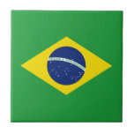 Brazil flag tile<br><div class="desc">The green color represents the country's forests,  the yellow diamond symbolizes its mineral riches,  the white is a symbol of peace and purity,  while the blue is associated with the color of the sky.</div>
