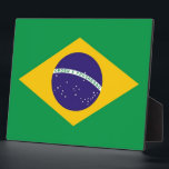 Brazilian Flag Plaque<br><div class="desc">Enhance your decor with this distinguished plaque featuring the flag of Brazil! Crafted with meticulous attention to detail, this plaque is more than just a decorative item; it's a celebration of Brazilian heritage and national pride. The design proudly showcases the iconic flag of Brazil, featuring a green field with a...</div>