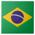 Brazilian Flag Tile<br><div class="desc">Enhance your living space with our striking tile featuring the flag of Brazil! Crafted with meticulous attention to detail, this tile is more than just a decorative piece; it's a celebration of Brazilian heritage and national pride. The bold design proudly showcases the iconic elements of the Brazilian flag, including the...</div>