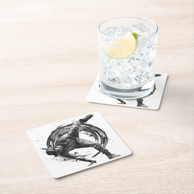 Breakdancer in action, in ink splatter style square paper coaster (Insitu)