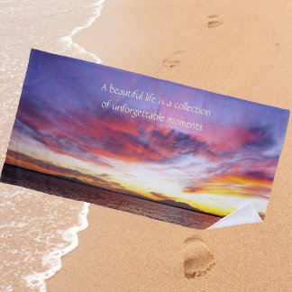 Breathtaking sunset over the sea beach towel