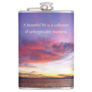 Breathtaking sunset over the sea hip flask