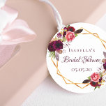 Bridal Shower watercolored florals burgundy gold Classic Round Sticker<br><div class="desc">A trendy Bohemian boho style button for a bridal shower. Decorated with watercolored roses in burgundy and pink. Elegant white background. A faux gold geometric frame. Templates for the bride's name and a date. With the text: Bridal Shower written with a hand lettered style script. Burgundy coloured letters. Great as...</div>