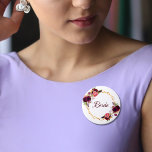 Bridal watercolored florals burgundy gold 6 cm round badge<br><div class="desc">A trendy Bohemian boho style button for a bridal shower. Decorated with watercolored roses in burgundy and pink. Elegant white background. A faux gold geometric frame. With the text: Bride written with a hand lettered style script. Burgundy coloured letters. Great as a as a keepsake for the bride or as...</div>