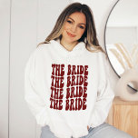 Bride Dark Red Customised Matching Bridal Party Hoodie<br><div class="desc">Are you looking for a unique and personalised bachelorette party outfit? Look no further than the dark red Bride hoodie. This sweatshirt is perfect for your group of girlfriends. It features a fun and colourful design that will match any theme you choose for your bachelorette party. Plus, it's made from...</div>