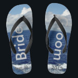 Bride Groom Ocean Waves Blue Sky Jandals<br><div class="desc">My Original Photography & Graphic Design. One-of-a-kind Bride Groom flip flops custom designed. Pretty Blue Sky with Fluffy White Clouds, Blue Sea and White Foam Ocean Waves. Unisex Flip Flops with Bride and Groom written in a silver colour text, and Date of Marriage in darker grey text. PERSONALIZE with your...</div>