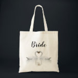 Bride swan couple elegant wedding tote bag<br><div class="desc">Simple, elegant and romantic! Two pretty white swans in love bending their heads together for a tender kiss, the heads forming a heart. White elegant background. Black hand lettered script and the text: Bride A swan couple stay together for life, so they are the perfect symbol of love and weddings!...</div>