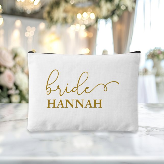 Bride - Team Bride! Gift Name  Accessory Pouch ("This Bride / Team Bride accessory and makeup bag showcases a sleek beige-gold script font with eleg)