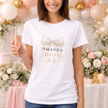 Bride to be ivory bow pearls elegant Bachelorette T-Shirt<br><div class="desc">Elevate your bridal events with this sophisticated coquette-themed party collection. Each piece showcases a high-fidelity white satin bow paired with delicate pearl accents and timeless typography. This set is perfect for the modern bride wanting a cohesive look for her bachelorette trip and bridal shower.</div>