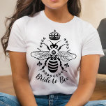 Bride to Bee Honeybee Crown Wedding | Personalised T-Shirt<br><div class="desc">This bee-autiful, simply elegant wedding t-shirt says "Bride to Bee" and shows a honeybee silhouette surrounded by a crown, fleur de lis, and a laurel wreath. You can also alter the "Bride to Bee" text for a different occasion or customise further to add more text. To see this design in...</div>
