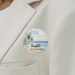Bridesmaid beach wedding name tag 6 cm round badge<br><div class="desc">A tropical beach,  waves and palm trees,  watercolored.  Personalise and add your bridesmaid's name.   Black handwritten style script.</div>