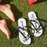 Bridesmaid Black and White Script Flip Flops<br><div class="desc">Outfit your besties in these pretty black and white flip flops featuring "bridesmaid" printed in elegant modern calligraphy typeface.</div>