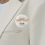Bridesmaid bow beige cream name tag 3 cm round badge<br><div class="desc">A beige,  cream coloured background. Decorated with a large bow.  Personalise and add your bridesmaid's name.   Black handwritten style script.</div>