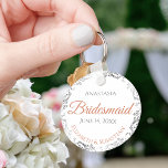 Bridesmaid Coral & Silver Lace White Wedding Gift Key Ring<br><div class="desc">These keychains are designed to give as favors to bridesmaids in your wedding party. They feature a simple yet elegant design with a white background, terracotta or coral orange and gray text, and a silver faux foil floral lace border. There is space for her name, the names of the couple,...</div>