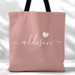 Bridesmaid Modern Script Heart Dusty Rose Tote Bag<br><div class="desc">This chic tote bag features a beautiful dusty rose background adorned with a modern script font and a delicate heart design. The soft, elegant colour and sophisticated typography make it an ideal accessory for bridesmaids or anyone who loves stylish and trendy designs. Perfect for carrying essentials, this tote bag adds...</div>