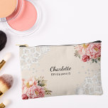 Bridesmaid pink florals lace peach beige accessory pouch<br><div class="desc">A peach,  beige coloured background. Decorated with pink roses,  flowers and white lace.
Personalise and add your bridesmaid's name.</div>