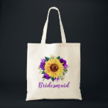 Bridesmaid Sunflower Purple Rose Floral Tote Bag<br><div class="desc">This bridesmaid tote bag features a watercolor sunflower and purple roses floral design. You can personalise it with a name. Please visit our store or our collection pages for more products featuring this design that you can customise for your needs.</div>