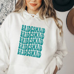 Bridesmaid Teal Personalised Matching Bridal Party Hoodie<br><div class="desc">Are you planning a beach themed bachelorette party or wedding? If so, this is the perfect hoodie sweatshirt for you! It features a retro 70s look with matching bridesmaids teal hoodies. The hoodie is made of a comfortable and warm fabric, perfect for a hot summer day. The bride and her...</div>