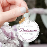 Bridesmaid Wedding Gift Cassis Purple & Gray Lacy Key Ring<br><div class="desc">These keychains are designed to give as favors to bridesmaids in your wedding party. They feature a simple yet elegant design with a white background, magenta or cassis purple & Gray text, and a silver faux foil floral border. Perfect way to thank your bridesmaids for being a part of your...</div>