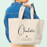 Bridesmaid Wedding Simple Modern Script Name<br><div class="desc">Bridesmaid Wedding Simple Modern Calligraphy Script Personalised Name Tote Bags features your bridesmaid's name in elegant black calligraphy script accented with a simple love heart with the addition of your custom text such as the date and bridemaid. Text and heart colours can be adjusted in the editor to suit your...</div>