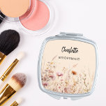 Bridesmaid wildflowers beige cream pink compact mirror<br><div class="desc">Beige,  cream coloured background. Decorated with wildflowers in beige,  cream and pink.  Personalise and add your bridesmaid's name.   Black handwritten style script.</div>